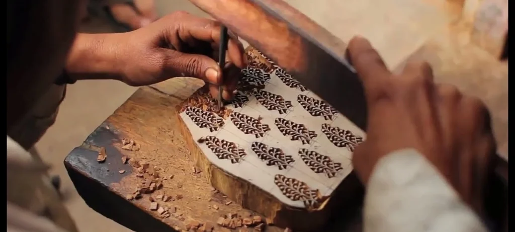 hand block carving for printing on pashmina shawl in kashmir